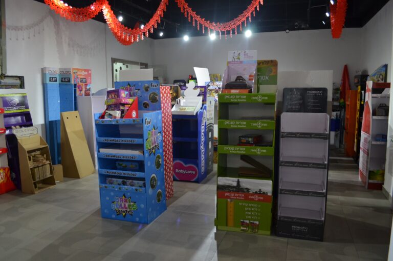 Custom cardboard floor displays FSDU and PDQ retail displays in Holidaypac showroom for B2B wholesale buyers