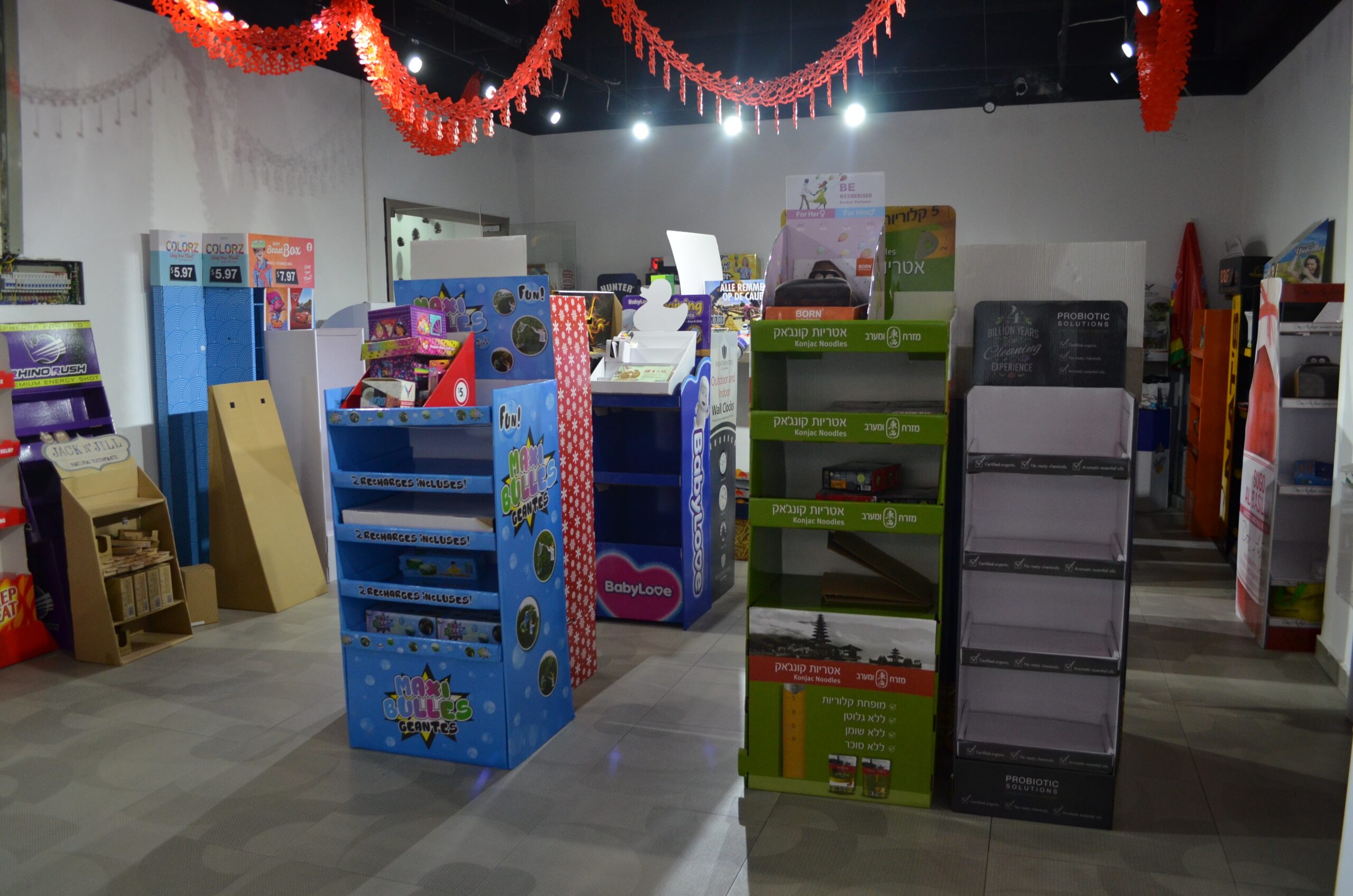 Custom cardboard floor displays FSDU and PDQ retail displays in Holidaypac showroom for B2B wholesale buyers