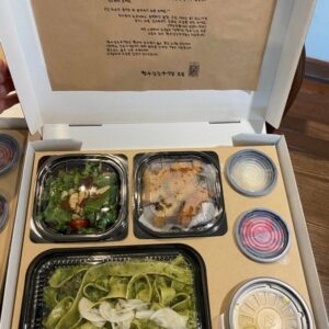 Korean style multi-compartment picnic lunch box with pasta salad and side dishes - Holidaypacfactory custom takeaway food box