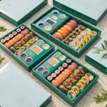 Holidaypacfactory green sushi box lifestyle set with multiple takeaway boxes
