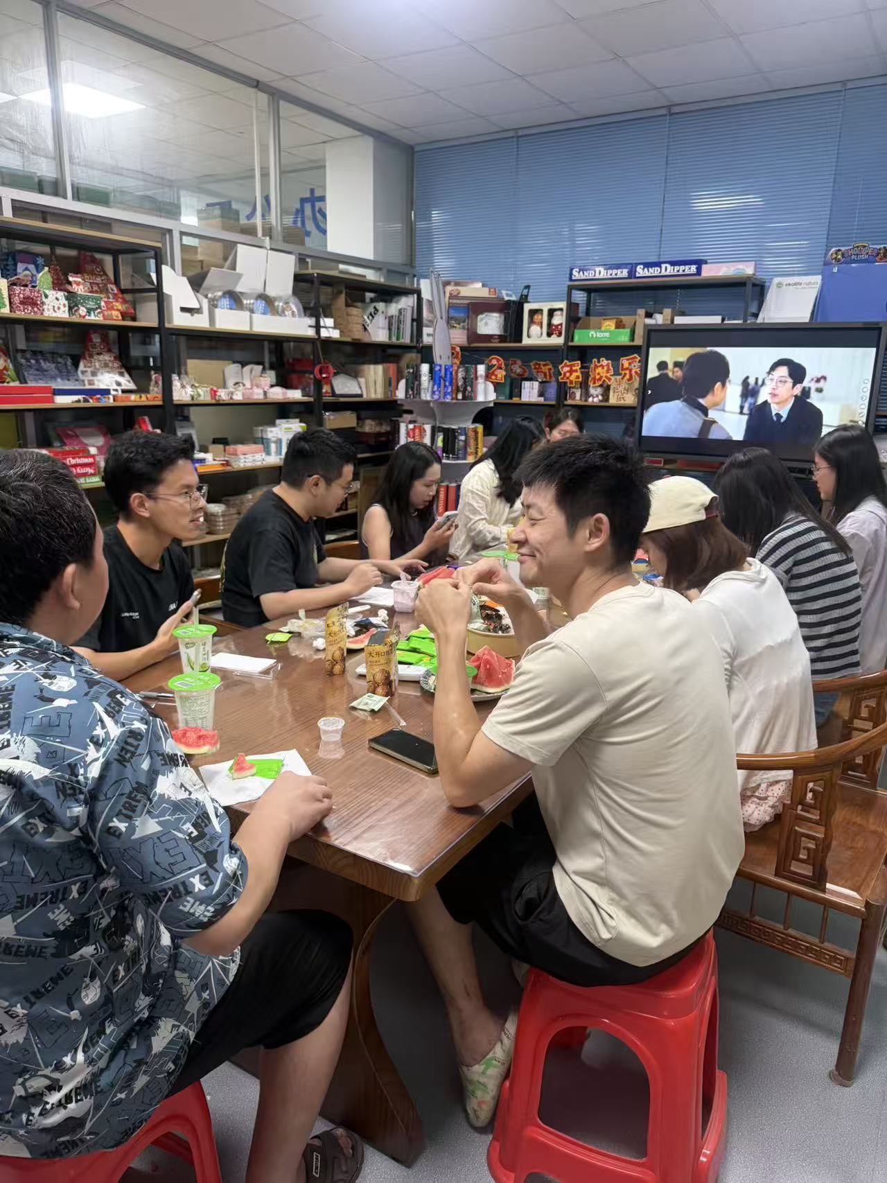 Holidaypac team enjoying food and conversation together at the Dragon Boat Festival employee culture event