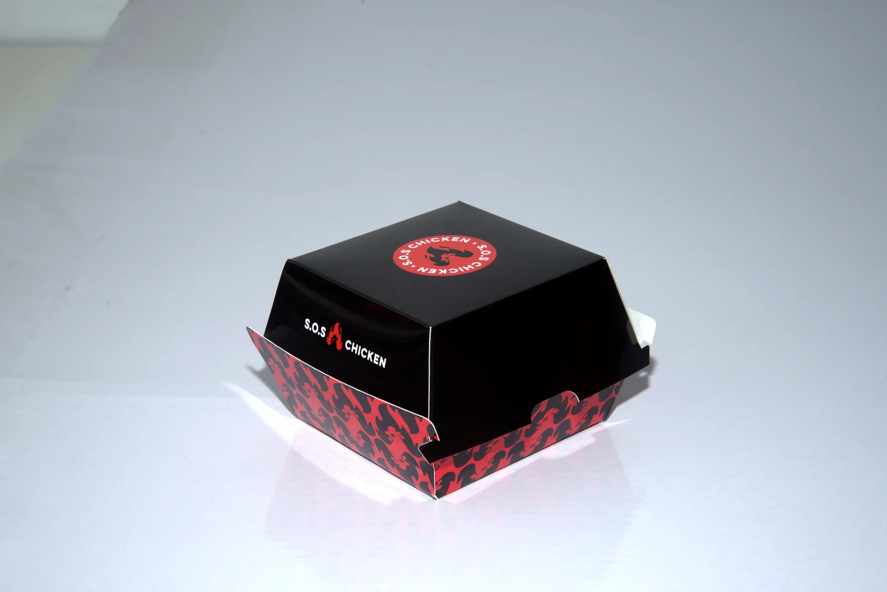 Holidaypacfactory holidaypac factory custom chicken takeaway packaging case study Top label view confirms brand mark placement on the lid.