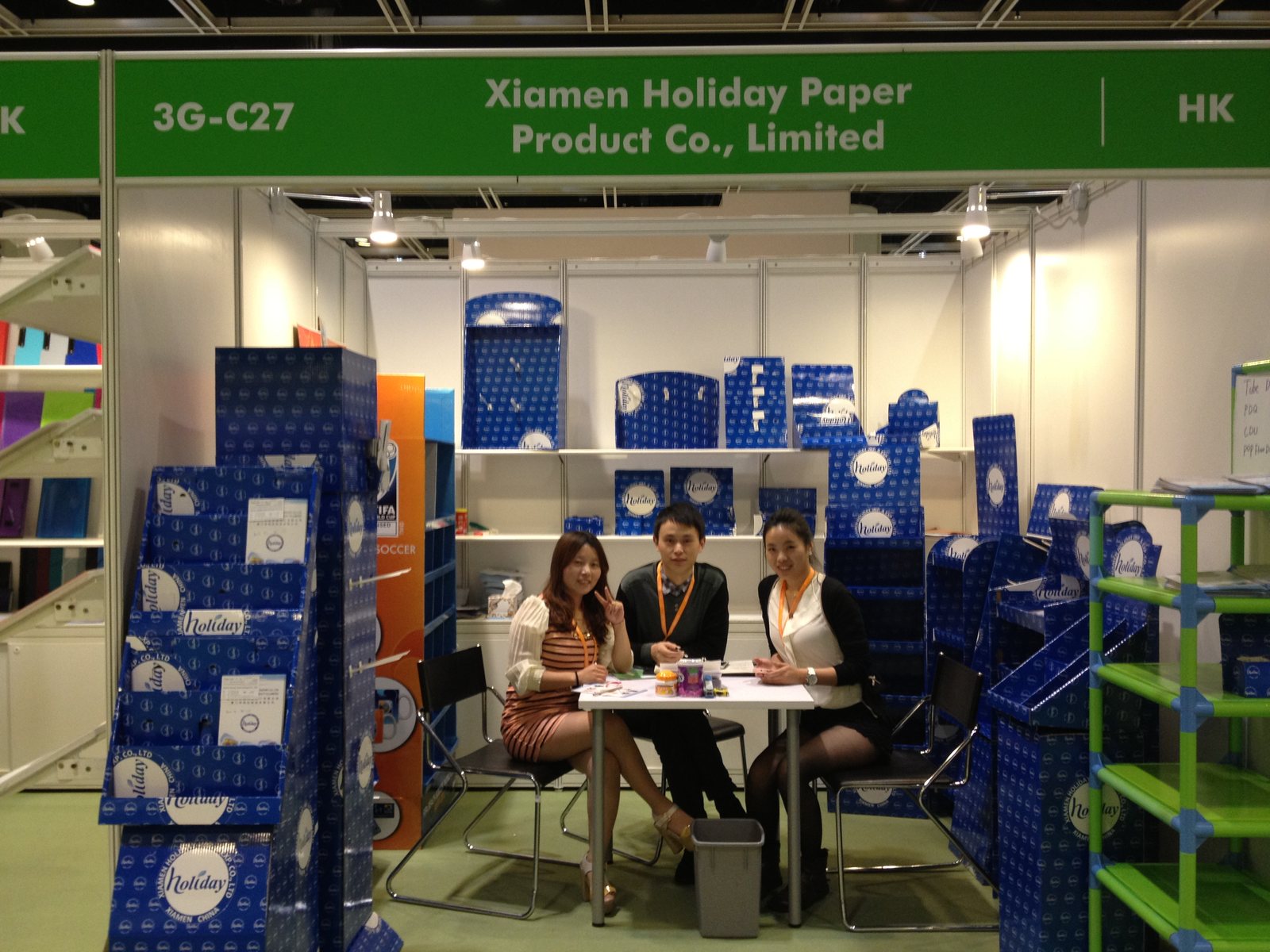 Holidaypacfactory holidaypac factory trade show history Hong Kong booth blue paper display packaging team