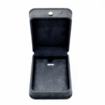 Black suede jewelry box empty interior and retention detail