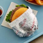 Holidaypacfactory white foil laminated paper wrap for hot food full bleed product image 3