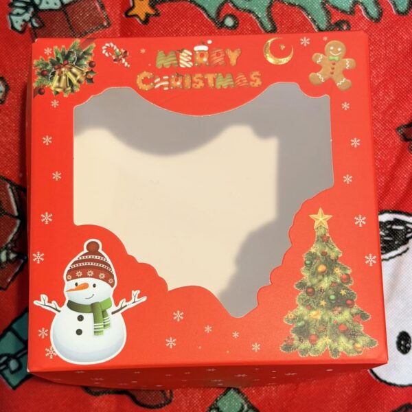 Christmas cookie bakery boxes with window Holidaypacfactory real Christmas packaging scene image 5 for holiday bakery, cookie gift and seasonal food retail