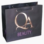 custom kraft paper bag with handles Holidaypacfactory image 2 for apparel, cosmetics, gifts, grocery items, bakery products, retail purchases, event packs and branded shopping bags