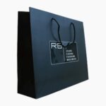 custom kraft paper bag with handles Holidaypacfactory image 5 for apparel, cosmetics, gifts, grocery items, bakery products, retail purchases, event packs and branded shopping bags