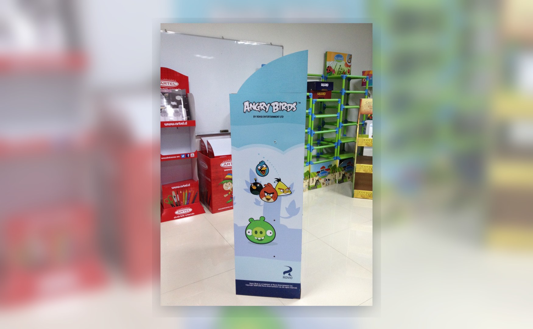 Holidaypacfactory holidaypac factory cardboard display stand with LCD screen side panel view showing the tall graphic area used for licensed or campaign artwork.