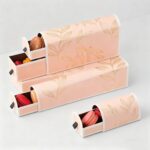 peach macaron drawer box packaging with gold leaf artwork Holidaypacfactory