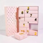 pink cosmetics advent calendar box with numbered drawers Holidaypacfactory