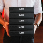 stacked black disposable sushi packaging boxes Holidaypacfactory