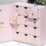 pink countdown drawer box with jewelry and message cards Holidaypacfactory