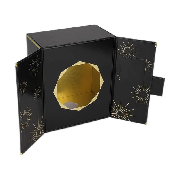 opened black folding perfume paper box with gold starburst print and display cavity Holidaypacfactory