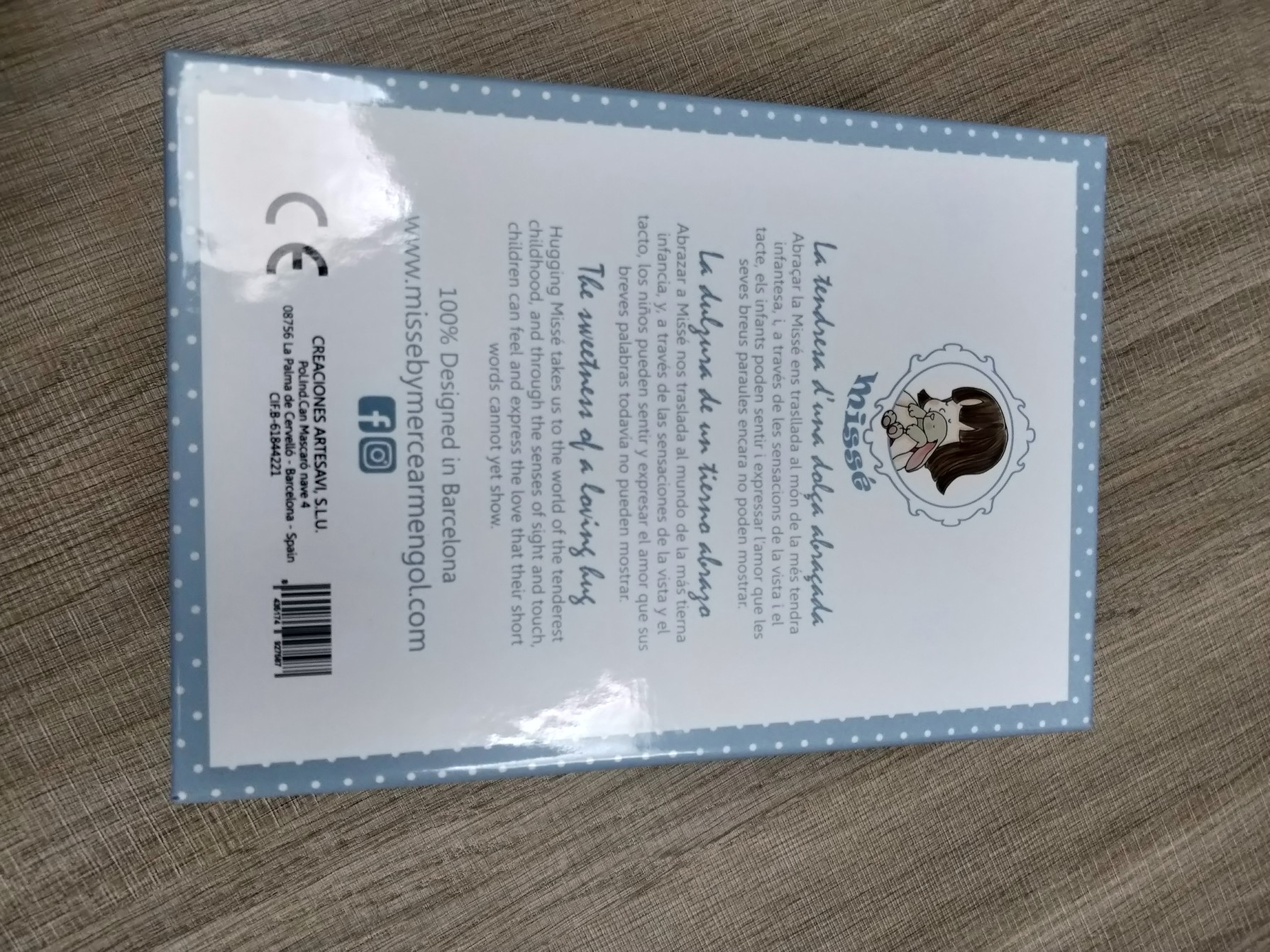 Back panel of custom doll gift box with multilingual product information
