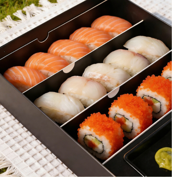 black sushi packaging box with separated salmon nigiri and roll compartments Holidaypacfactory
