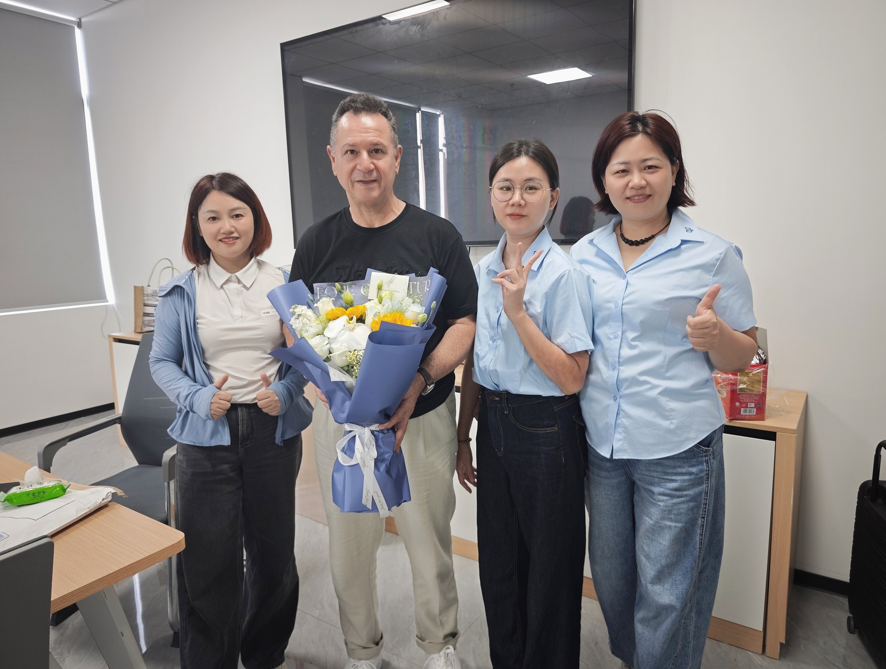 Holidaypac team with an overseas client at the packaging factory