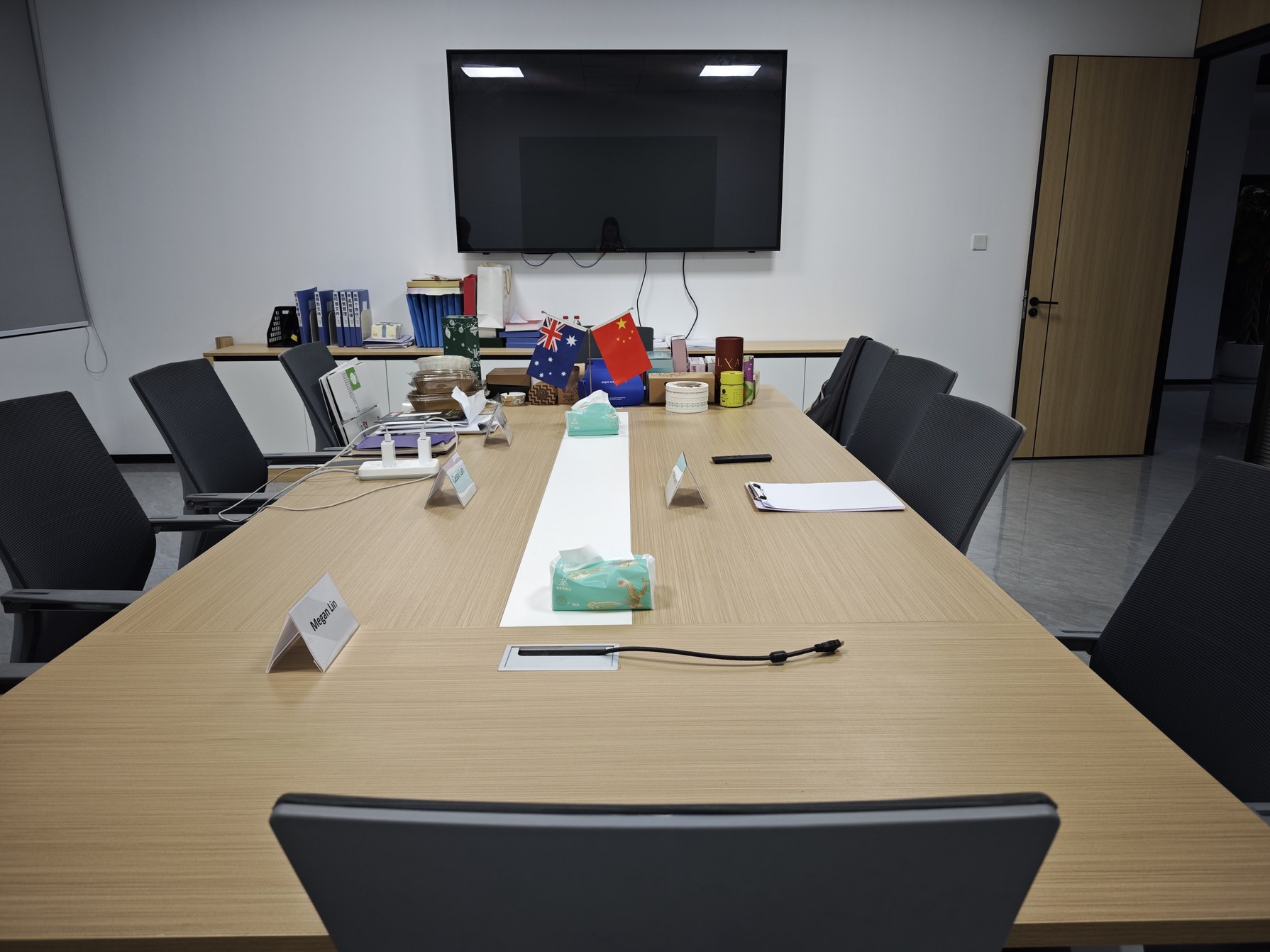 Meeting room prepared for an Australian customer visit with Australian and Chinese flags