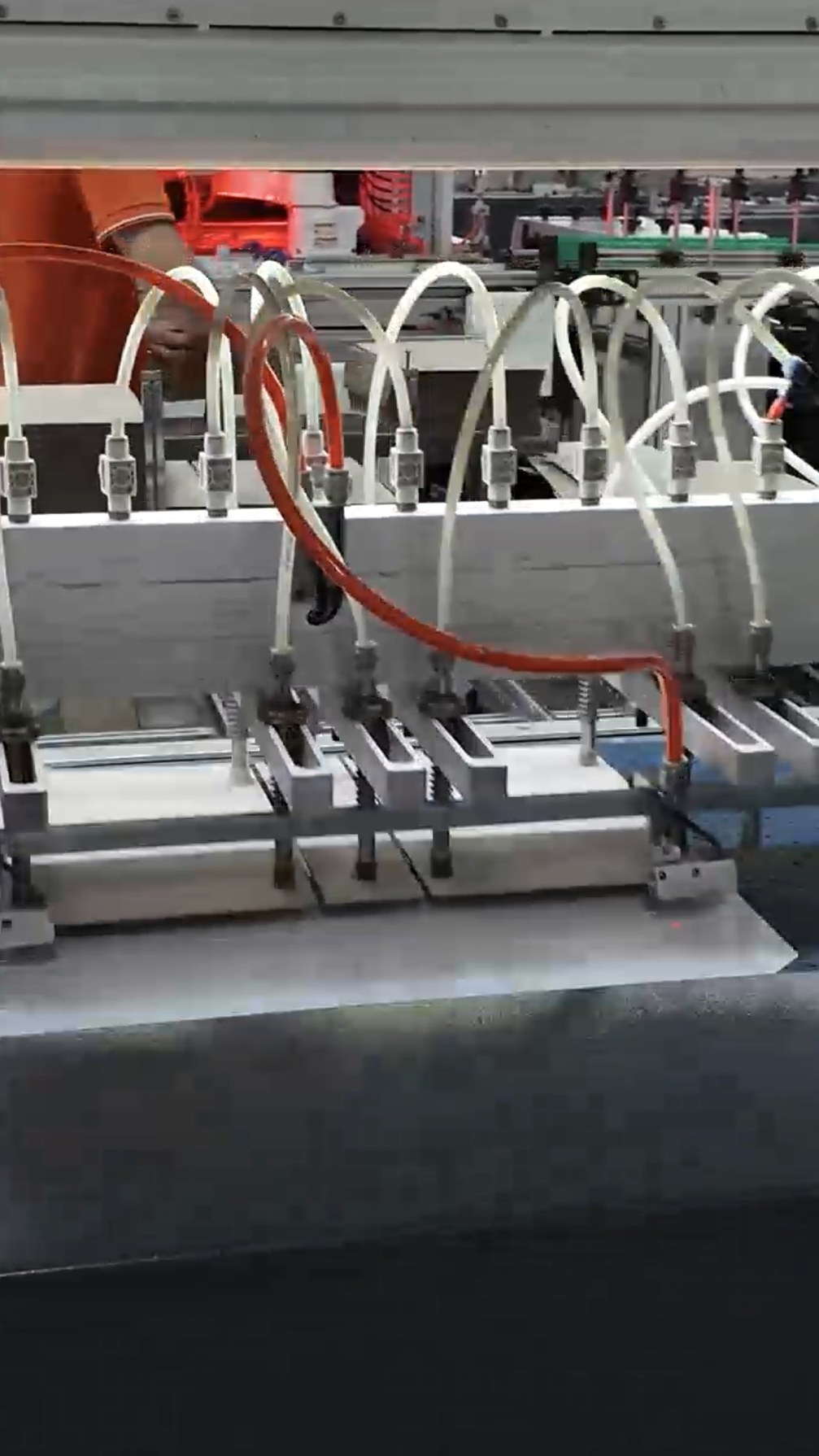 Packaging production line with automated material handling and finishing equipment
