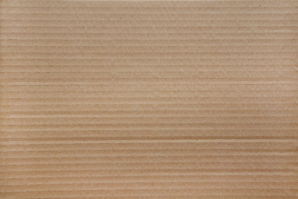Recyclable corrugated kraft cardboard texture