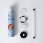 Complete parts of the Holidaypac sushi push-up tube kit laid out for assembly