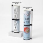 Nested dual-size sushi tube packaging showing inner sauce tube and outer paper tube diameter