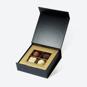four-piece chocolate gift box with gold compartments and black hinged lid Holidaypacfactory